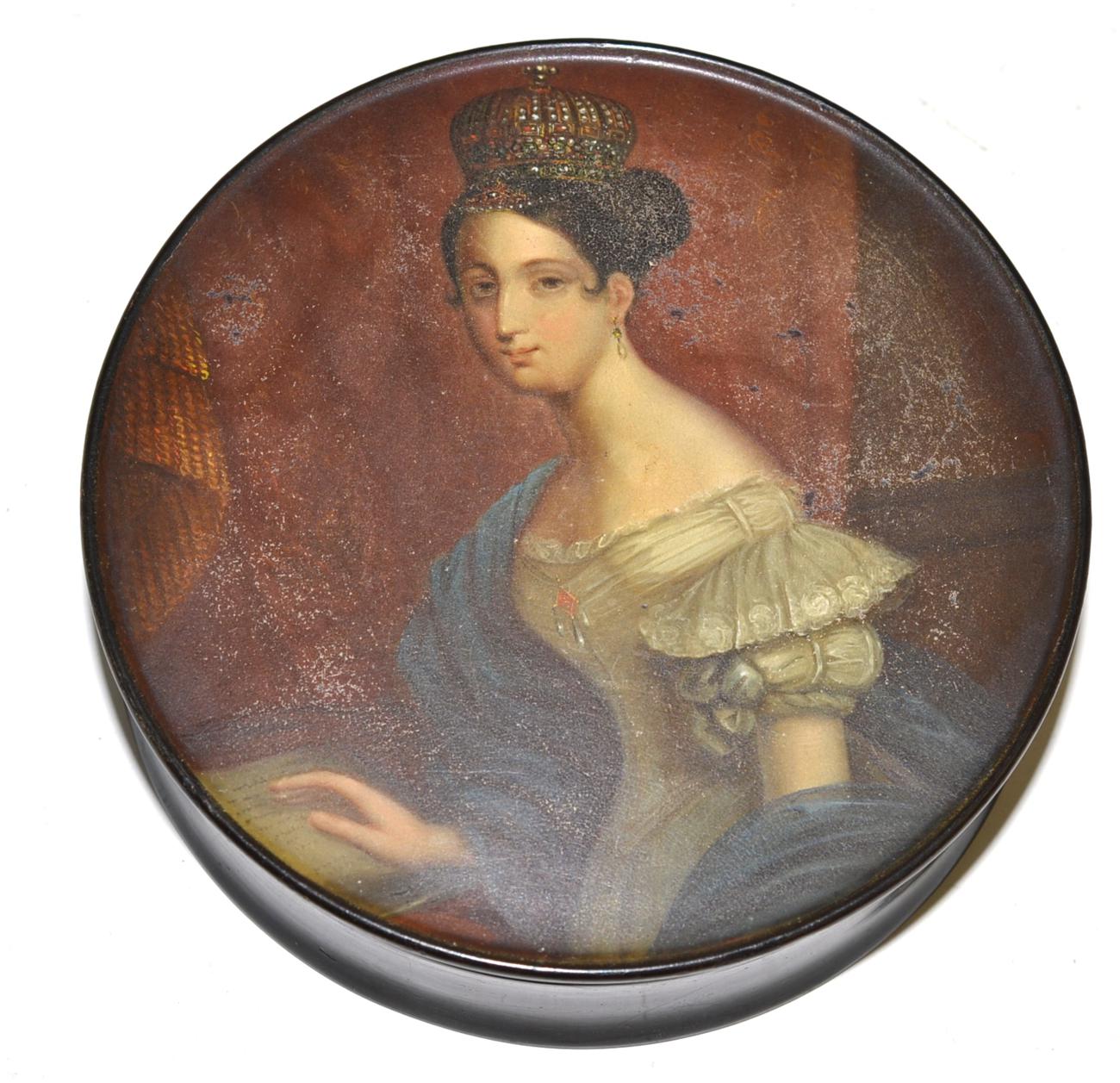 A lacquer circular box and cover, circa 1840, the cover painted with a bust portrait of Queen