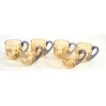 A set of six Baccarat glass liqueur/cordial cups, with blue stained twisted cane handles, enamel and