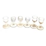 Six assorted 18th century firing glasses  No obvious damage noted