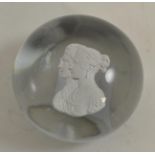 A sulphide paperweight, 19th century, set with bust portraits of Queen Victoria and Prince Albert,