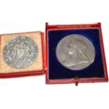 A Diamond Jubilee commemorative white metal medal, 1887, cast with bust portraits of a young and old