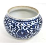A Chinese porcelain bowl painted on underglaze blue with scrolling lotus, 24cm wide  Large chips and