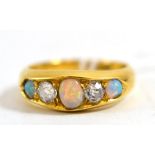 An opal and diamond five stone ring, circa 1880, the graduated oval cabochon opals alternate with