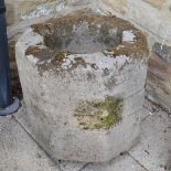 An octagonal stone font, 48cm high Allegedly used in Ripon for holding Holy water during the plague