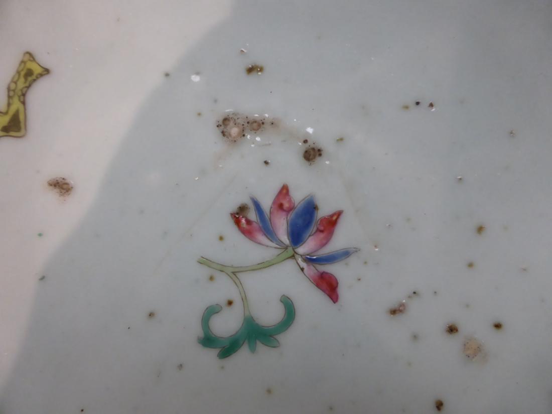 A Chinese porcelain bowl, painted in famille rose enamels with butterflies amongst foliage, bears - Image 3 of 7