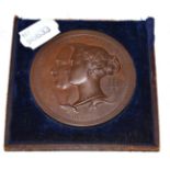 A bronze Great Exhibition prize medal, 1851, cast with bust portraits of Queen Victoria and Price