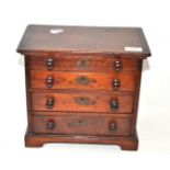 Early Victorian mahogany miniature four drawer chest  Good/used condition, later handles.