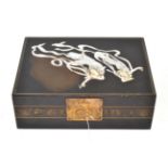 Japanese black lacquered and mother-of-pearl jewellery box, 34cm wide  Some minor losses to