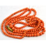 Two coral bead necklaces, both of graduated off-round beads, lengths 56cm each (approximately) (2)