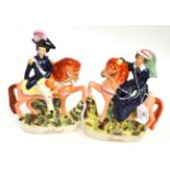 A pair of Staffordshire pottery equestrian figures of Queen Victoria and Albert, circa 1870,