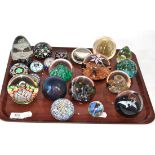 A collection of twenty 20th century glass paperweights of assorted shapes and sizes, including