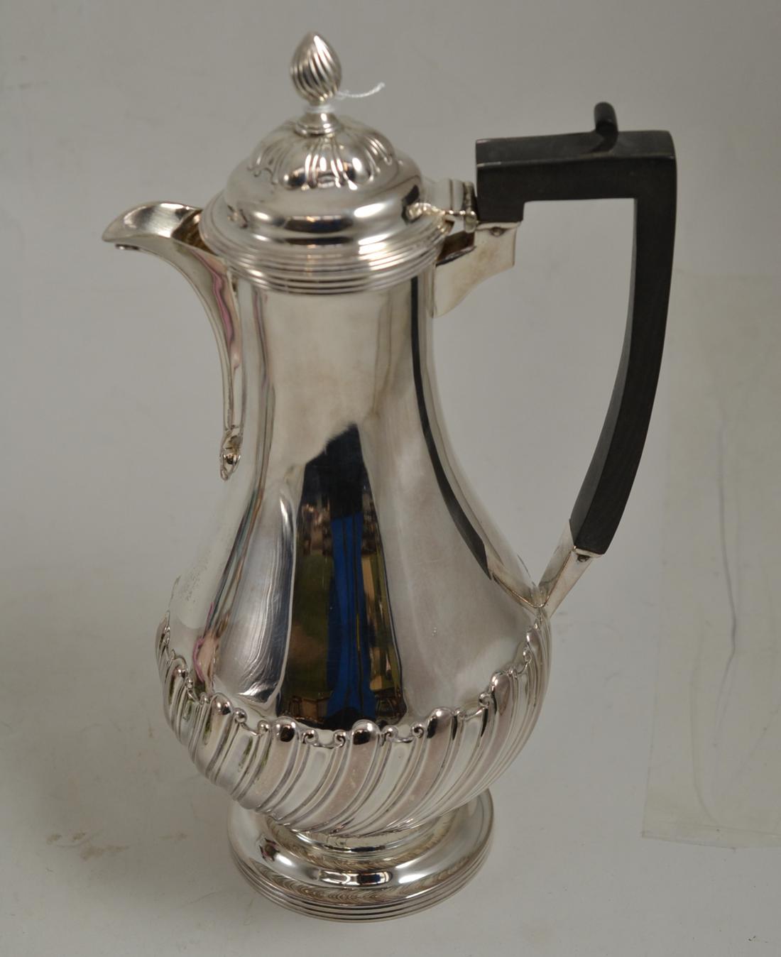 Silver coffee pot, London Assay 1958 Worn marks, hinge loose. 23ozt