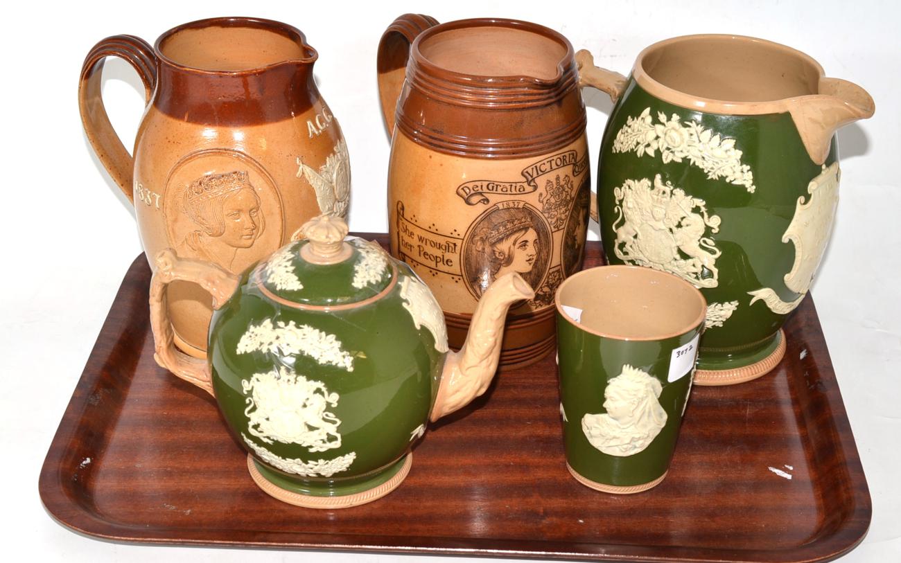 A Doulton Lambeth Diamond Jubilee commemorative jug, circa 1897, moulded with Britannia flanked by