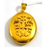 A Victorian locket, (believed 1888), with entwined initials to the front - possibly CIT - measures