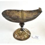 A French plated brass boat, early 18th century, of shell form with hinged cover, baluster stem,