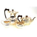Silver four piece tea service, Sheffield 1931  handles re-varnished, clear marks, matching, some
