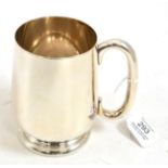 A silver tankard by Barker Brothers, Birmingham 1932, 12cm high  Clear marks, good condition