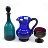 Blue glass jug, green glass rum decanter and an inscribed sugar bowl Rubbed gilding. Chips to