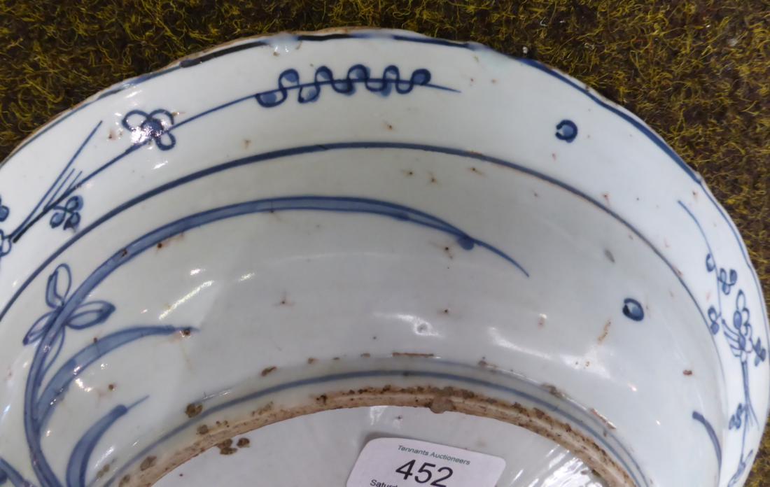 A Chinese porcelain circular dish, early 17th century, painted underglaze blue with ducks on a - Image 7 of 8