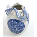 Chinese porcelain ovoid vase, shoulder applied with a dragon, painted underglaze blue with phoenix