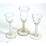 Three 18th century ale glasses with opaque stems  Chips throughout.