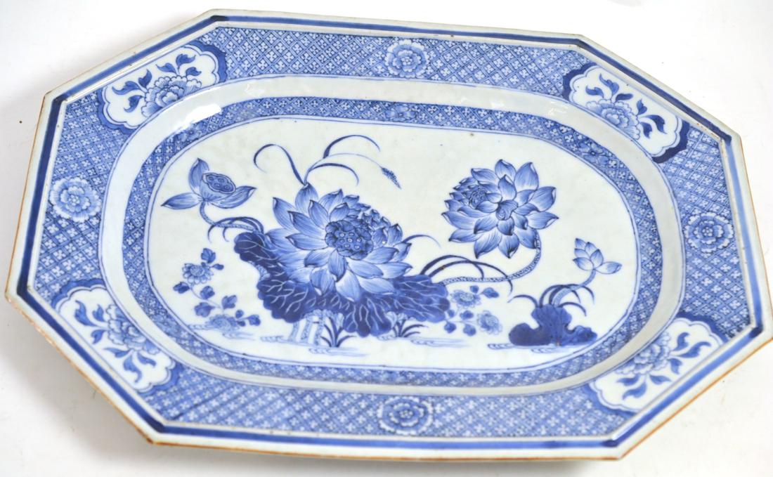 A Chinese porcelain meat platter, Quianlong, of canted rectangular form, painted underglaze blue
