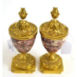 Pair of small 19th century urns in breche violette marble and gilt bronze No significant age,