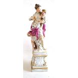 Dresden classical figure group standing on a parcel gilt pedestal base, 27cm high  Generally good