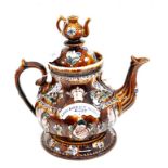 A Measham bargeware Golden Jubilee commemorative teapot and cover, 1887, with teapot knop