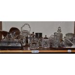 Two shelves of mainly silver plate including serving dishes, entree dishes, galleried tray, dressing