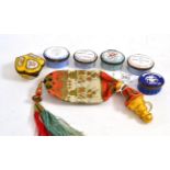 Six enamel patch boxes and a purse