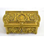 A Diamond Jubilee commemorative cast brass jewellery casket/musical box circa 1897, of shaped