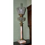 Victorian brass oil lamp with marble column support, 77cm high