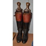 Pair of leather riding boots, with wooden trees