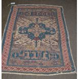 Unusual Shirvan rug, East Caucasus, the charcoal field with a single cruciform medallion framed by