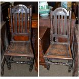 A pair of early 18th century joined oak chairs with solid seats