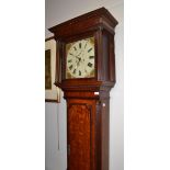 An oak eight day longcase clock, early 19th century, flat top pediment, mahogany crossbanded
