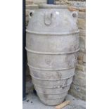 Large terracotta olive jar planter with ribbed body and four handles, 125cm high