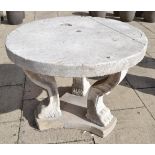 An Istrian marble table, early 20th century, the circular top on three scroll supports with paw feet