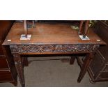 A carved Anglo-Indian single drawer hardwood side table