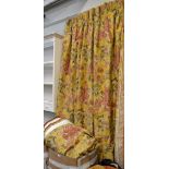 Two pairs of floral yellow curtains with drapery and cord tiebacks