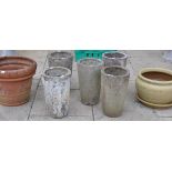Terracotta planter, 48cm diameter; set of five glazed planters, 42cm high; and a glazed planter with