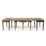 An early 19th century mahogany dining table, in the manner of Gillows, in three sections, raised