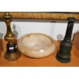 Three lamps and an alabaster bowl