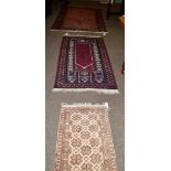 A Balouch prayer rug, West Afghanistan, the field with four latch hook medallions beneath the Mihrab