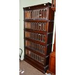 A Globe Wernicke five piece sectional bookcase with leaded glass doors