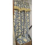 Two pairs of floral blue and white curtains and four tiebacks
