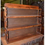 A set of Victorian rosewood four tier hanging shelves with spindle turned supports