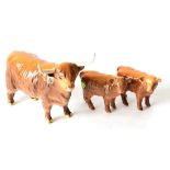 Beswick Cattle: Highland Cow, model No. 1740; Highland Calf, model No. 1827D; and another calf