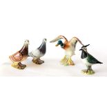 Beswick Birds comprising: Pigeon, model No. 1383A, first version, red gloss; Pigeon, model No.